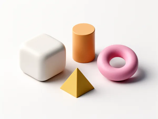 A white rounded cube, orange cylinder, yellow pyramid, and pink torus on a white surface with soft shadows.