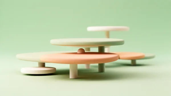 3D rendering of minimalist circular platforms in pastel colors on a light green background with soft lighting.